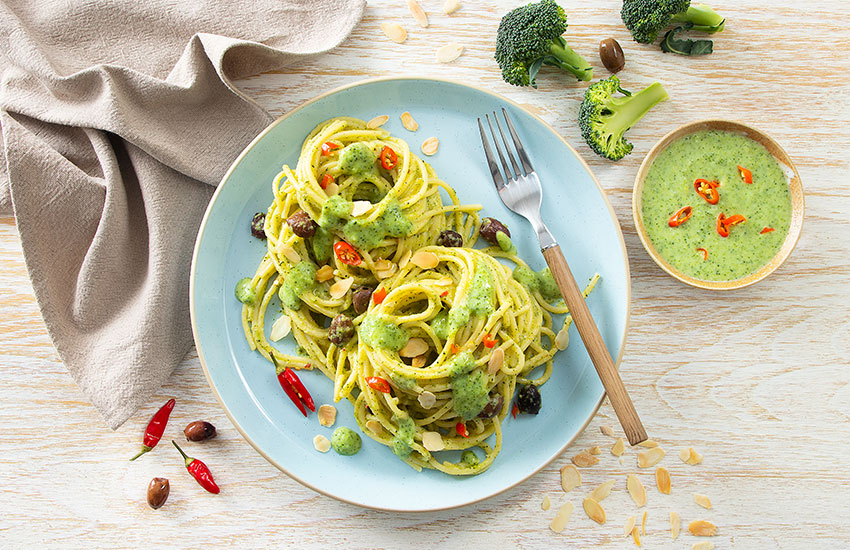 Spaghetti with creamy broccoli sauce and toasted almonds